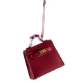 Hermes Micro Kelly Twilly Charm Rouge Vif Tadelakt Leather Gold Hardware